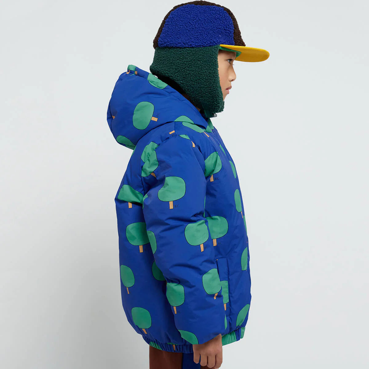 Green Trees All Over Blue Anorak by Bobo Choses